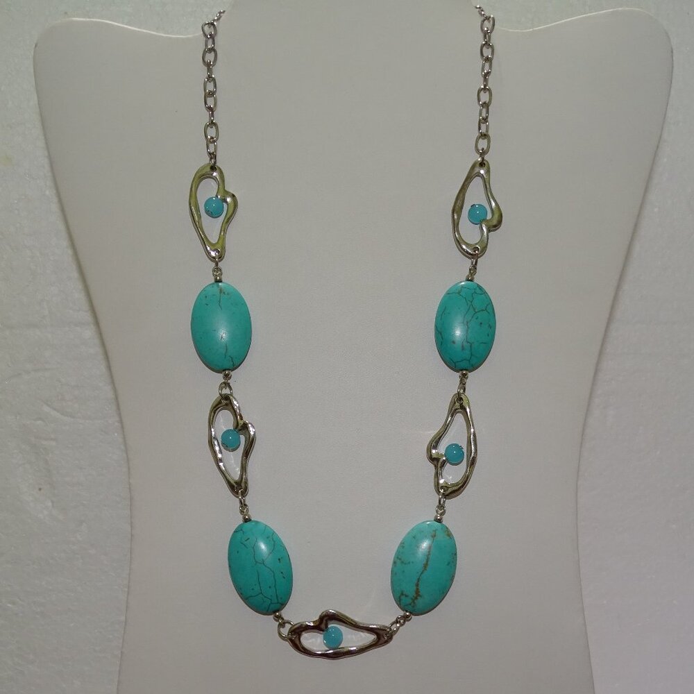 A BEATIFUL STATEMENT OF SILVER WITH TOURQOISE